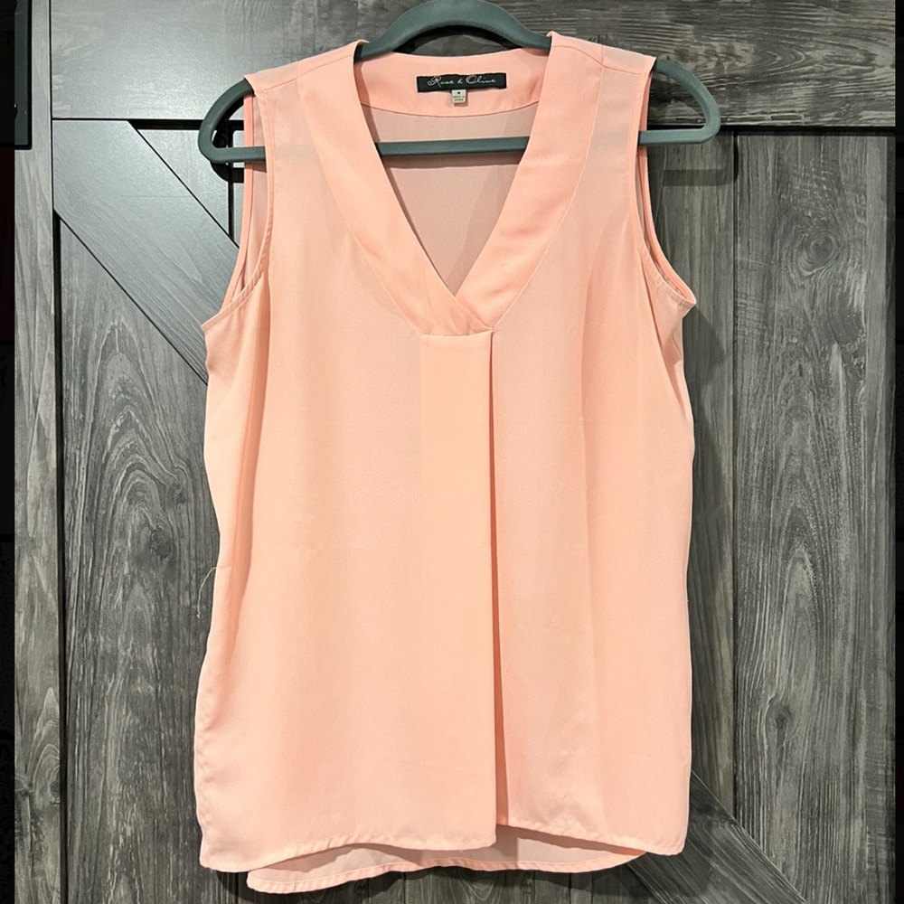 Sheer pink women’s V Neck top, size M